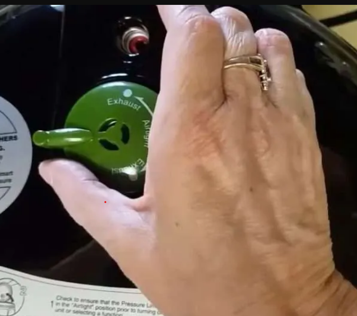 If you're wondering if the Nesco Electric canner is USDA approved, the answer is no, but it has many safety features, such as the pressure weight shown in this image.