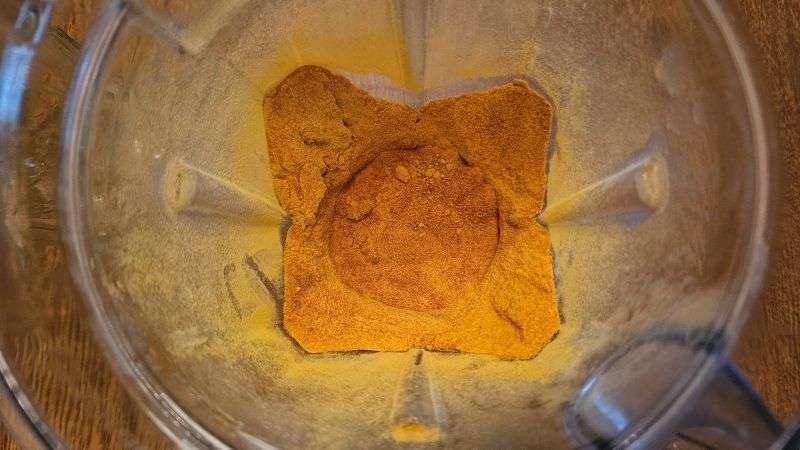 Top view of pumpkin powder ground finely in a blender.
