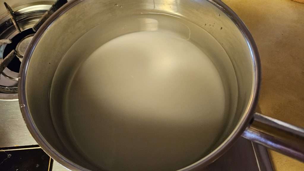 1 cup of sugar in 6 cups of water in a saucepan.