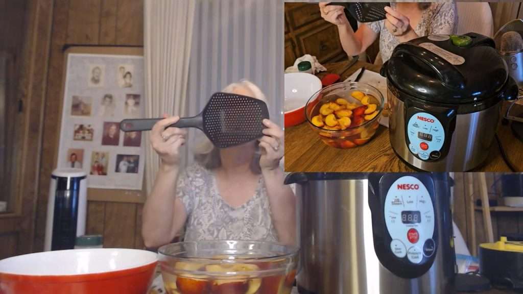 holding up a slotted spoon to spoon nectarines into canning jars.