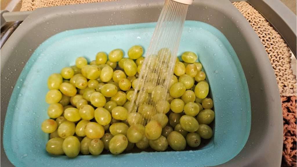 It's important to wash grapes thoroughly before freezing them.