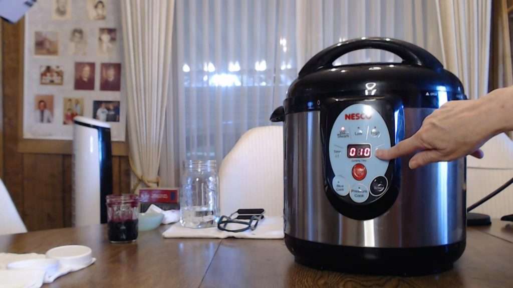 setting the timer on the Nesco canner to 10 minutes.