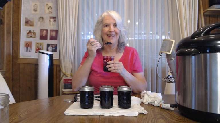getting ready to take a bite of home canned blueberry jam