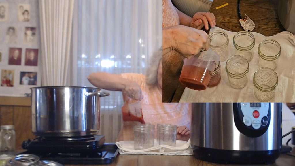 filling canning jars with pizza sauce.