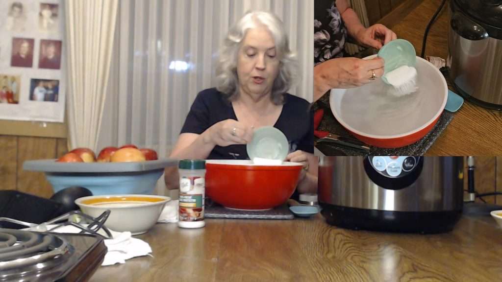 Pouring Ball Fresh Fruit Produce Protector into a bowl of water
