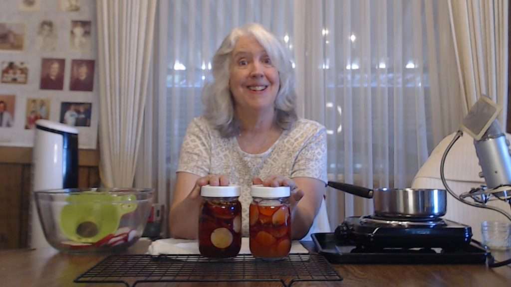 Smiling with two pints of quick pickled radishes