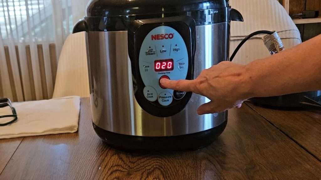 20 minutes displayed on the Nesco canner.