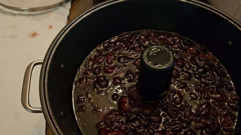 Completed cherry jam after it had finished processing in the jam maker.