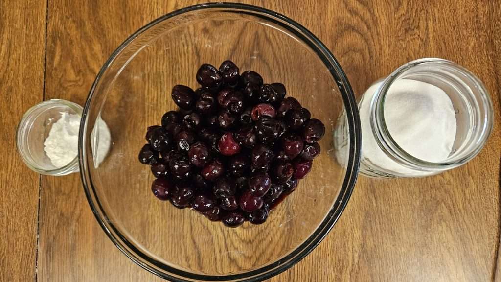 3 simple ingredients for freezer cherry pie filling are cornstarch, cherries, and sugar.