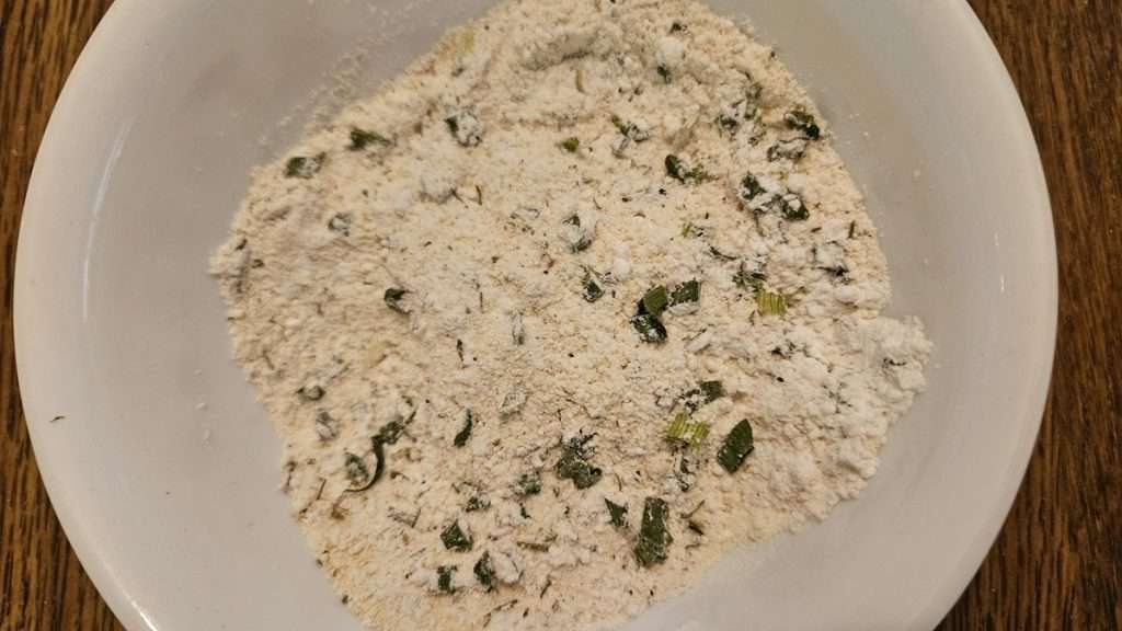 The dry ingredients in a bowl after they were whisked together.